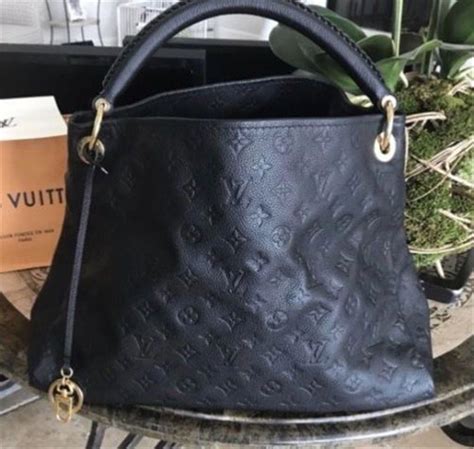 louis vuitton black bag gold|louis vuitton bag black original.